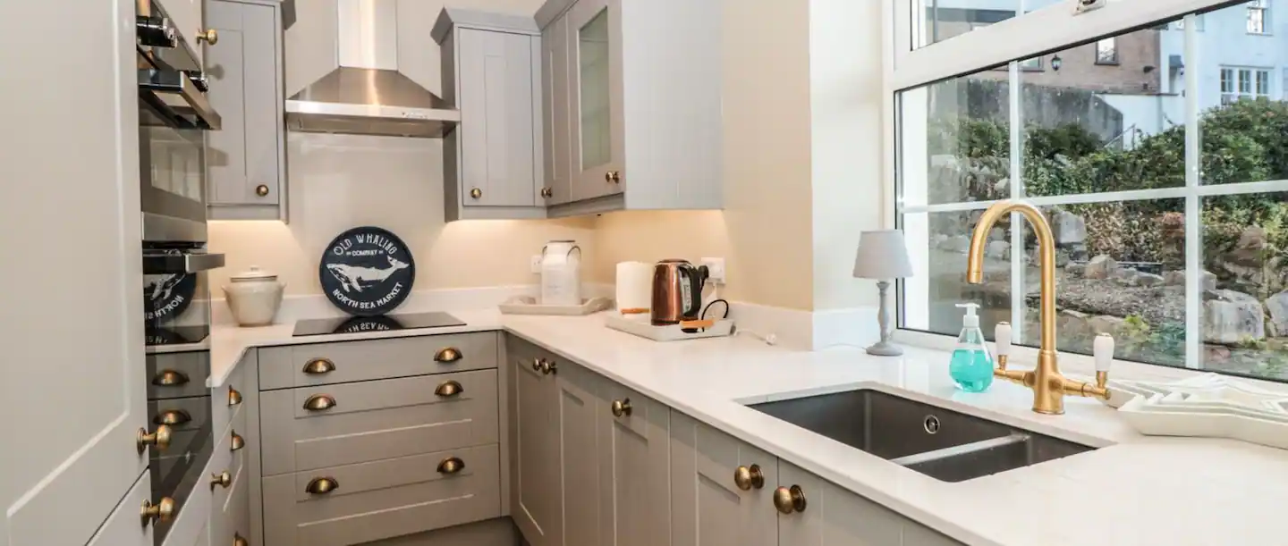 Kitchen with double oven, microwave, dishwasher